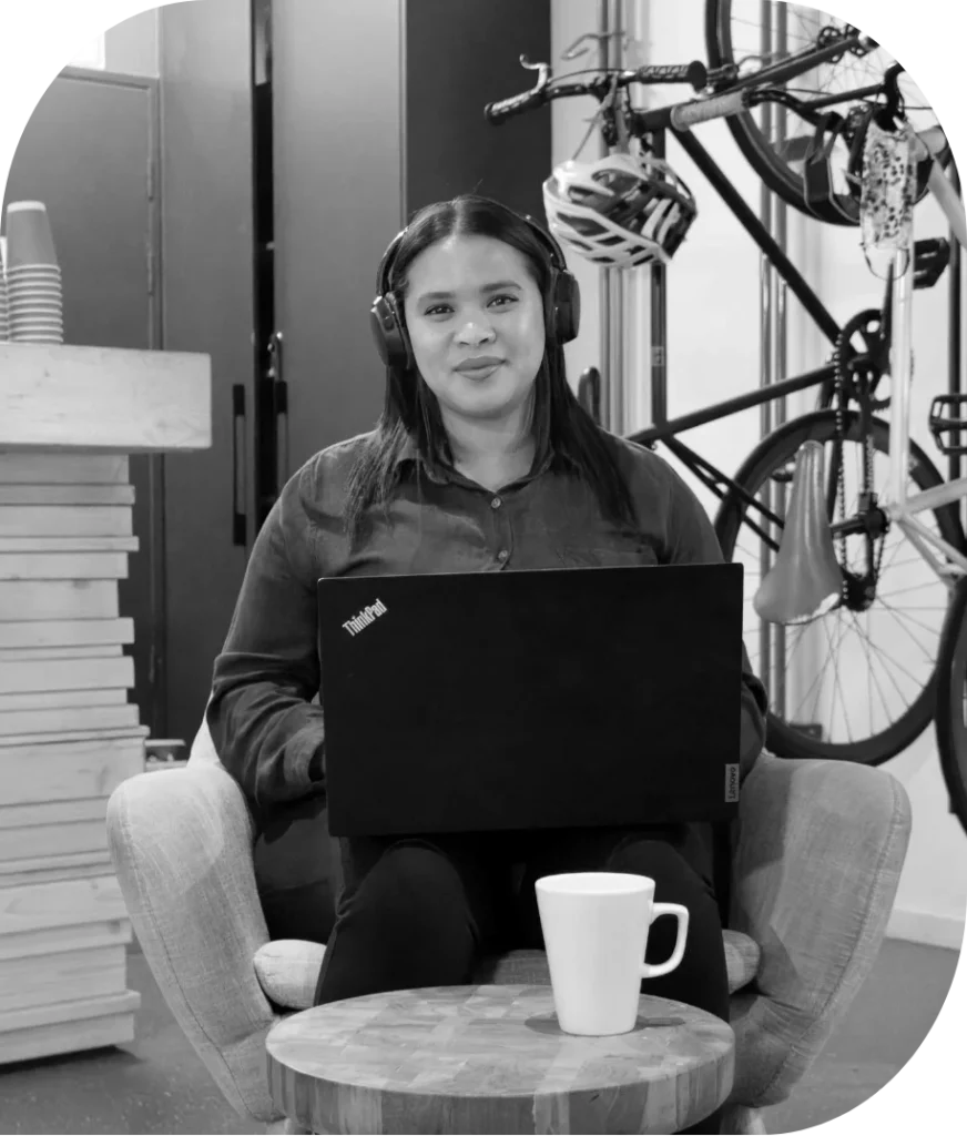 Stacy Wicomb working at her desk, IT Girl at RSAWEB.